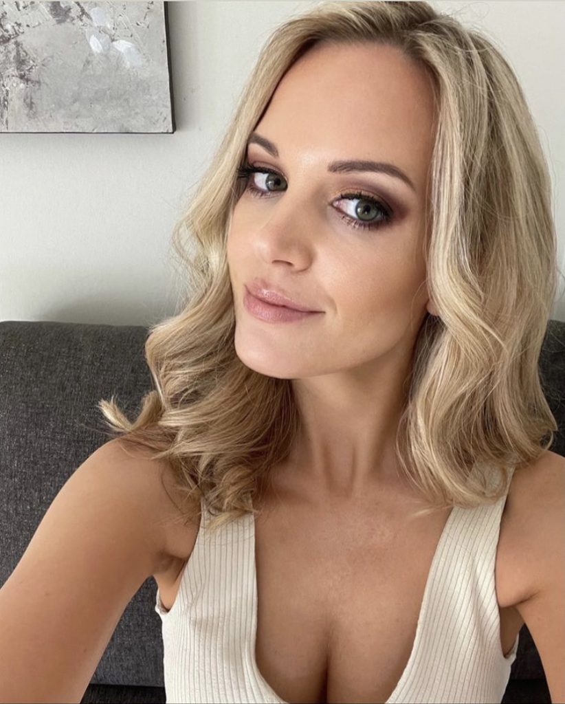 woman with hair and makeup done