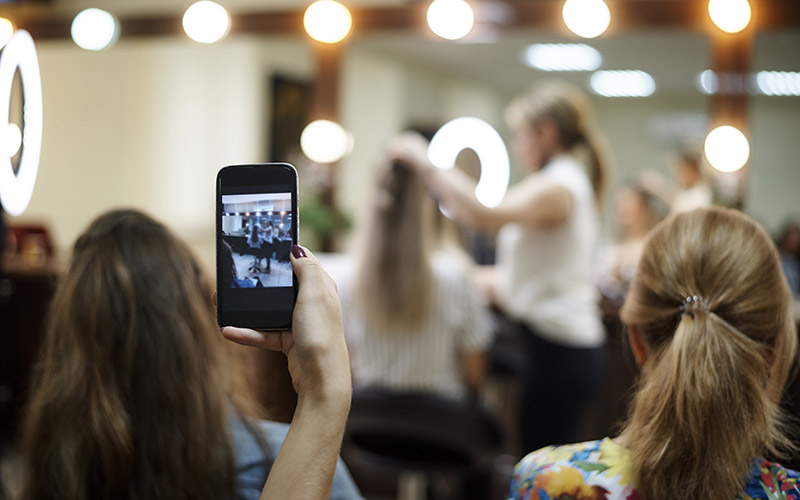 phone image of a mobile hair and makeup artist at work