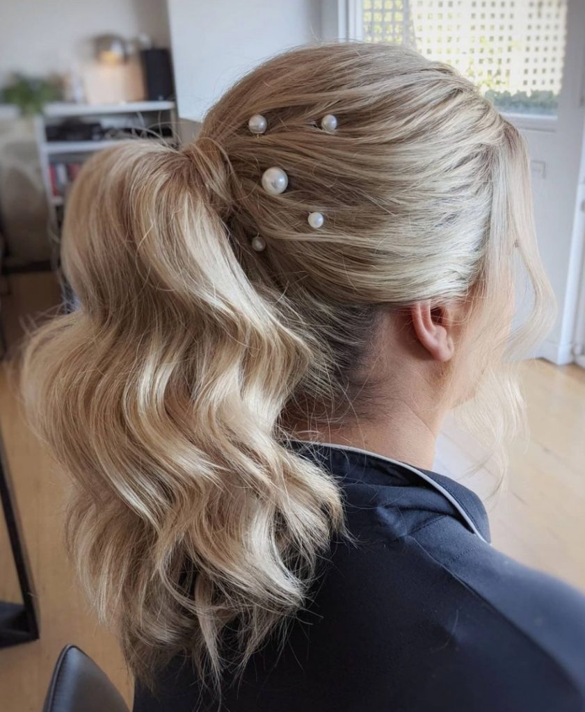 woman with bridal hair and makeup done