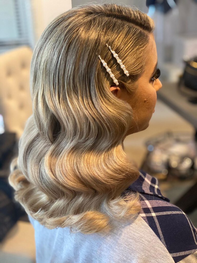 side of view of the bride with her hair and makeup done for her melboune wedding