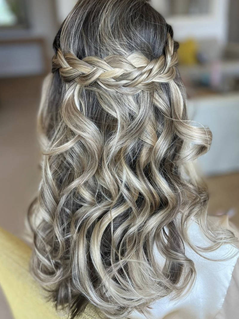 Rear view of a model with Privé Clip-in Hair Extensions